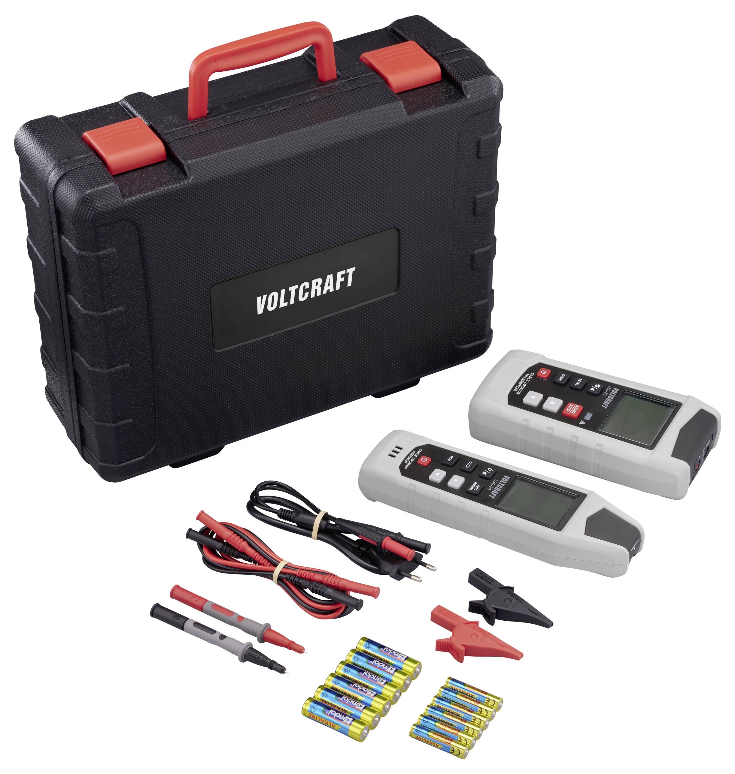 'Voltcraft' elektronische testkit inclusief twee digitale multimeters, kabels, sondes en batterijen, weergegeven naast een zwart en rood draagtas.