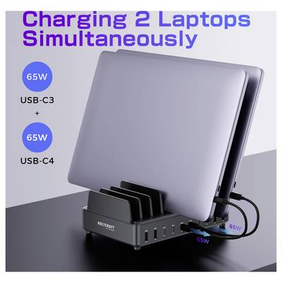 'Afbeelding met twee laptops die tegelijkertijd worden opgeladen op een dockingstation. Tekst: 2 Laptops Tegelijkertijd Opladen. Poorten: USB-C3 en USB-C4, elk 65W.'