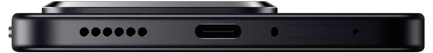 Een close-upafbeelding van de onderkant van een smartphone toont de USB-C-poort, luidsprekeropeningen en een mogelijke microfoon- of SIM-kaart-sleuf.