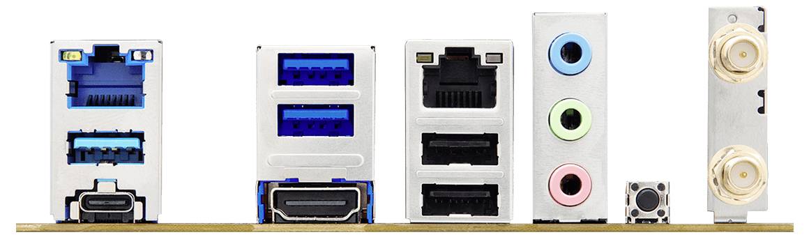Een verscheidenheid aan computerpoorten op een moederbord, waaronder USB, HDMI, Ethernet, audioaansluitingen en resetknop.