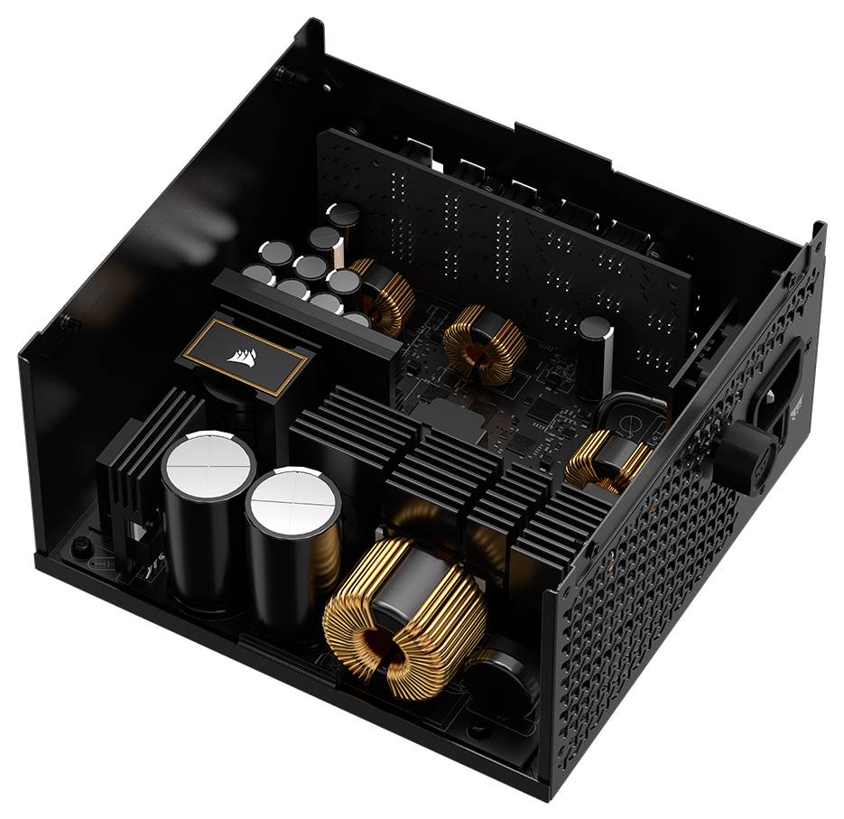 Een gedeeltelijk open voedingsunit van een computer met elektronische componenten zoals condensatoren, spoelen en een printplaat.