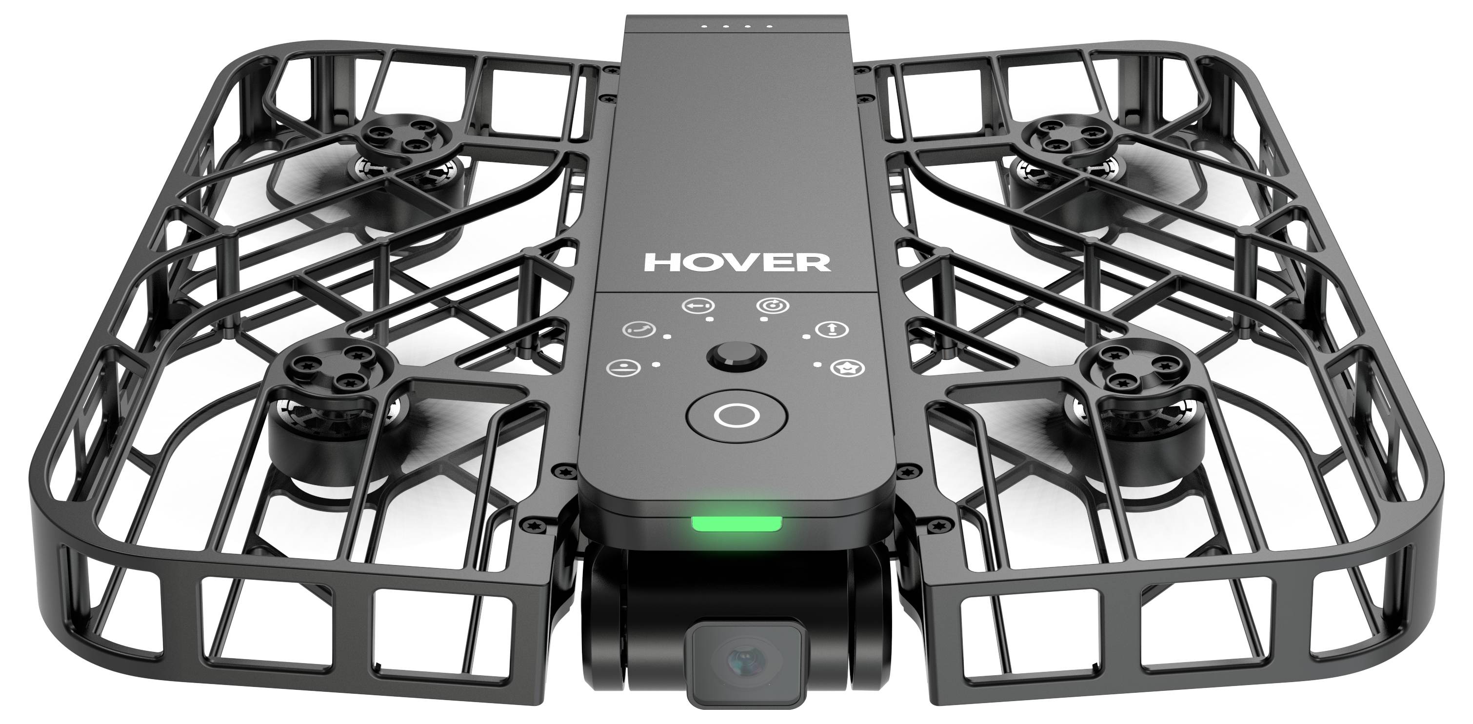 Een compacte, zwarte drone met propellerbeschermers, een camera aan de voorkant en bedieningsknoppen bovenop, met de merknaam 'Hover' weergegeven.