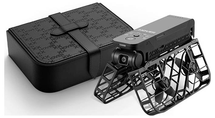 Een draagbare drone met beschermende behuizing wordt naast zijn transportkoffer tentoongesteld, waarbij een compacte vormgeving geschikt voor gemakkelijk vervoer wordt gedemonstreerd.