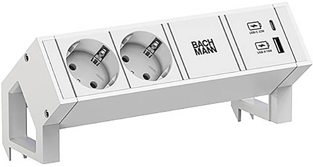 Een witte dubbele stopcontact met USB-poorten, gelabeld 'Bachmann,' ontworpen voor tafelblad-montage met een schuin, ergonomisch ontwerp.