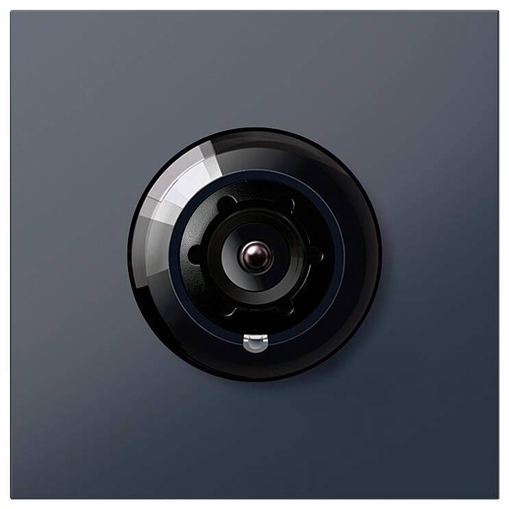 Nahaufnahme van een ronde cameralens gecentreerd op een donkere achtergrond, waarbij het glanzende oppervlak en de metalen details worden benadrukt.
