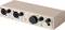 Een beige audio-interface met twee XLR/TRS combosleuven, een grote monitorvolumeregelaar en een koptelefoonaansluiting met het label 'MINIFUSE 2'.