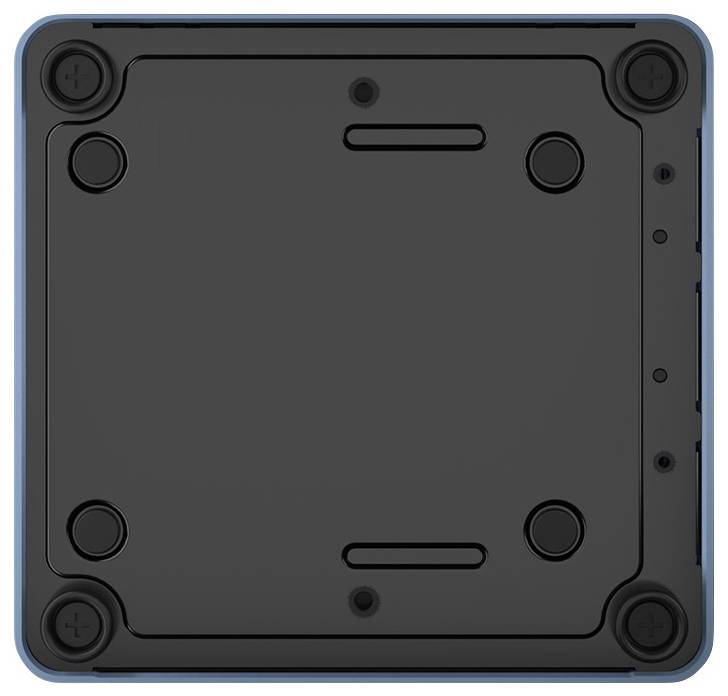 De afbeelding toont de onderaanzicht van een vierkaar apparaat of gadget met afgeronde hoeken, voorzien van rubberen voetjes en zichtbare schroeven voor stabiliteit.