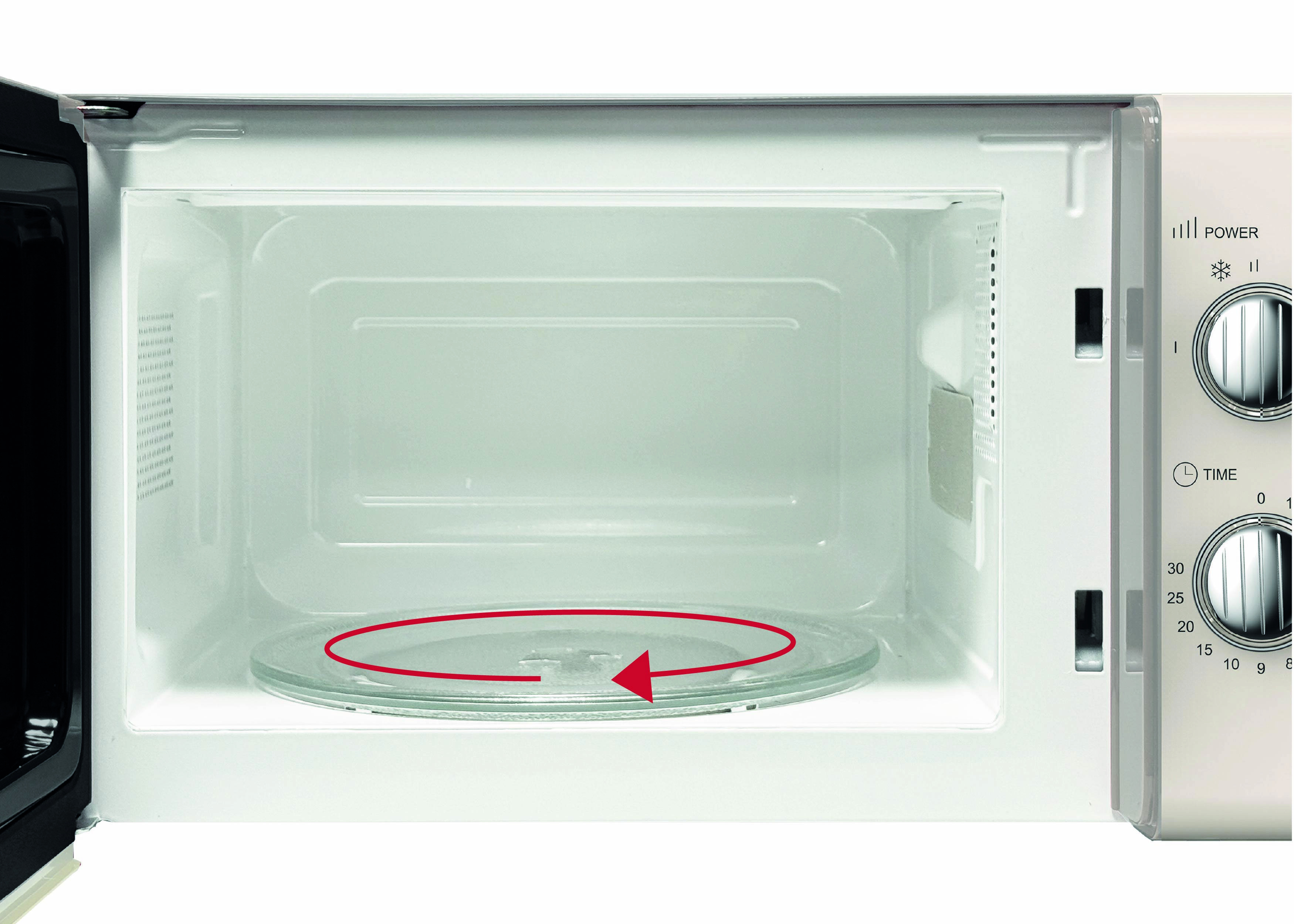 Open magnetron met een lege draaiende glazen plaat binnenin. Bedieningsknoppen aan de rechterkant tonen tijd- en vermogensinstellingen.
