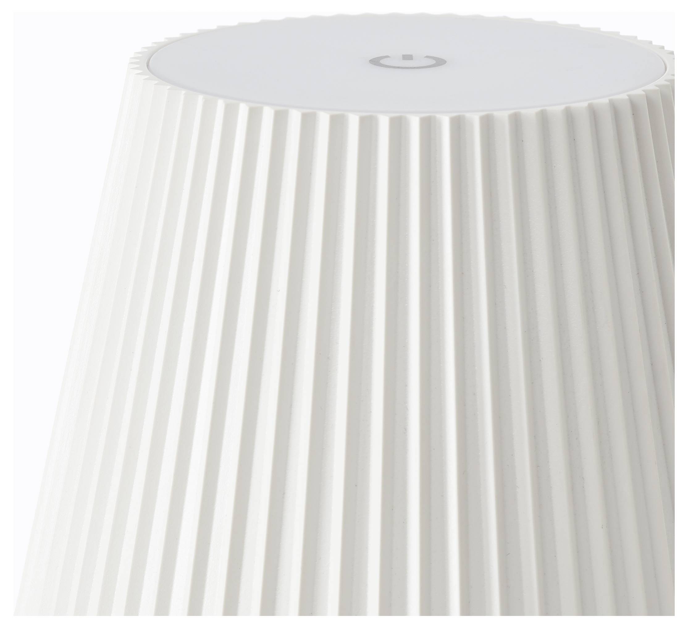 Een witte, geribbelde lampenkap gezien van bovenaf, met een circulair stroomsymbool bovenop, wat zijn functionaliteit aangeeft.