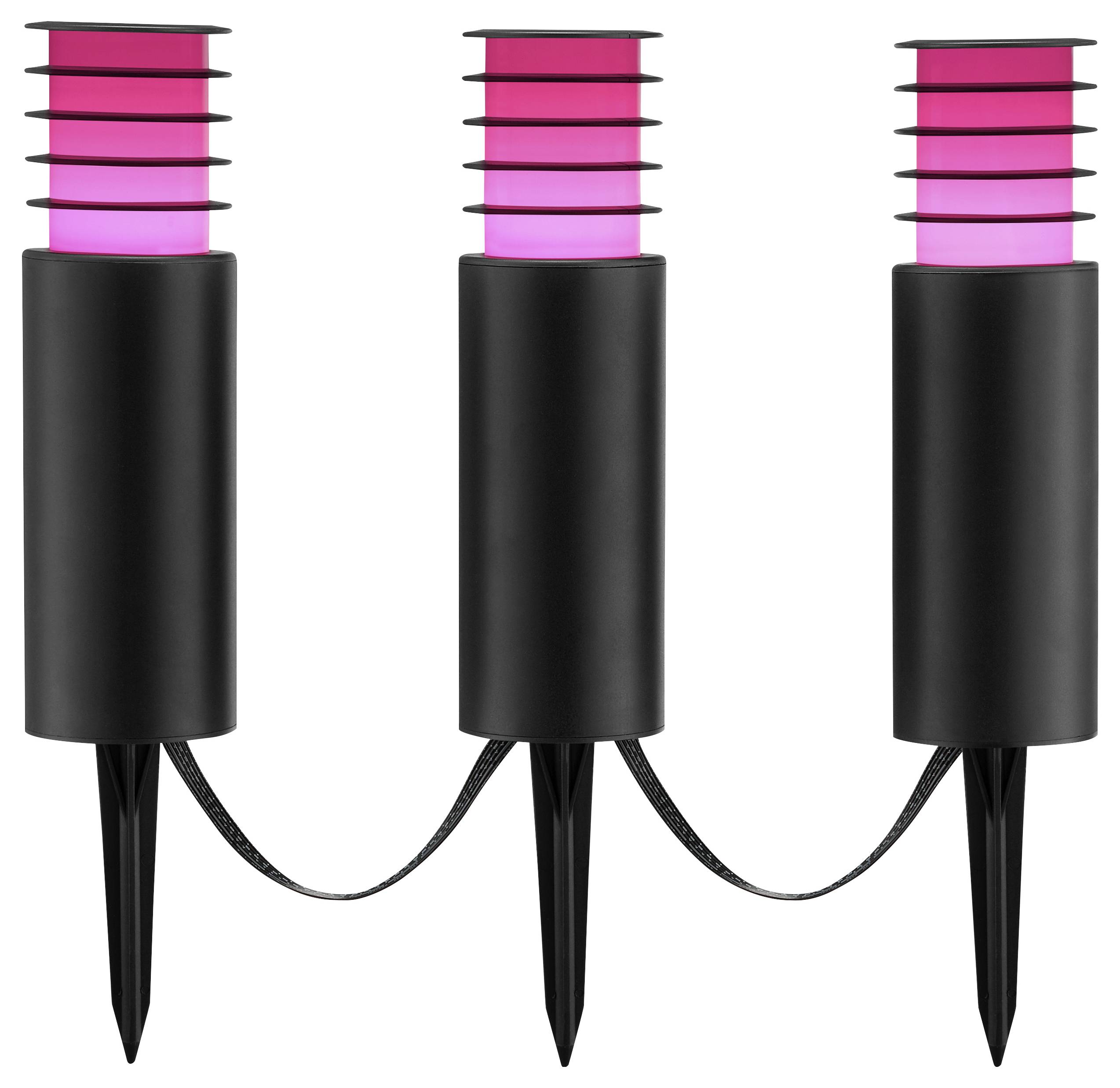 Drie zwarte, cilindrische buitenverlichting met roze luminiscentie, verbonden door een zwarte draad, elk gemonteerd op een pin voor plaatsing in de tuin.