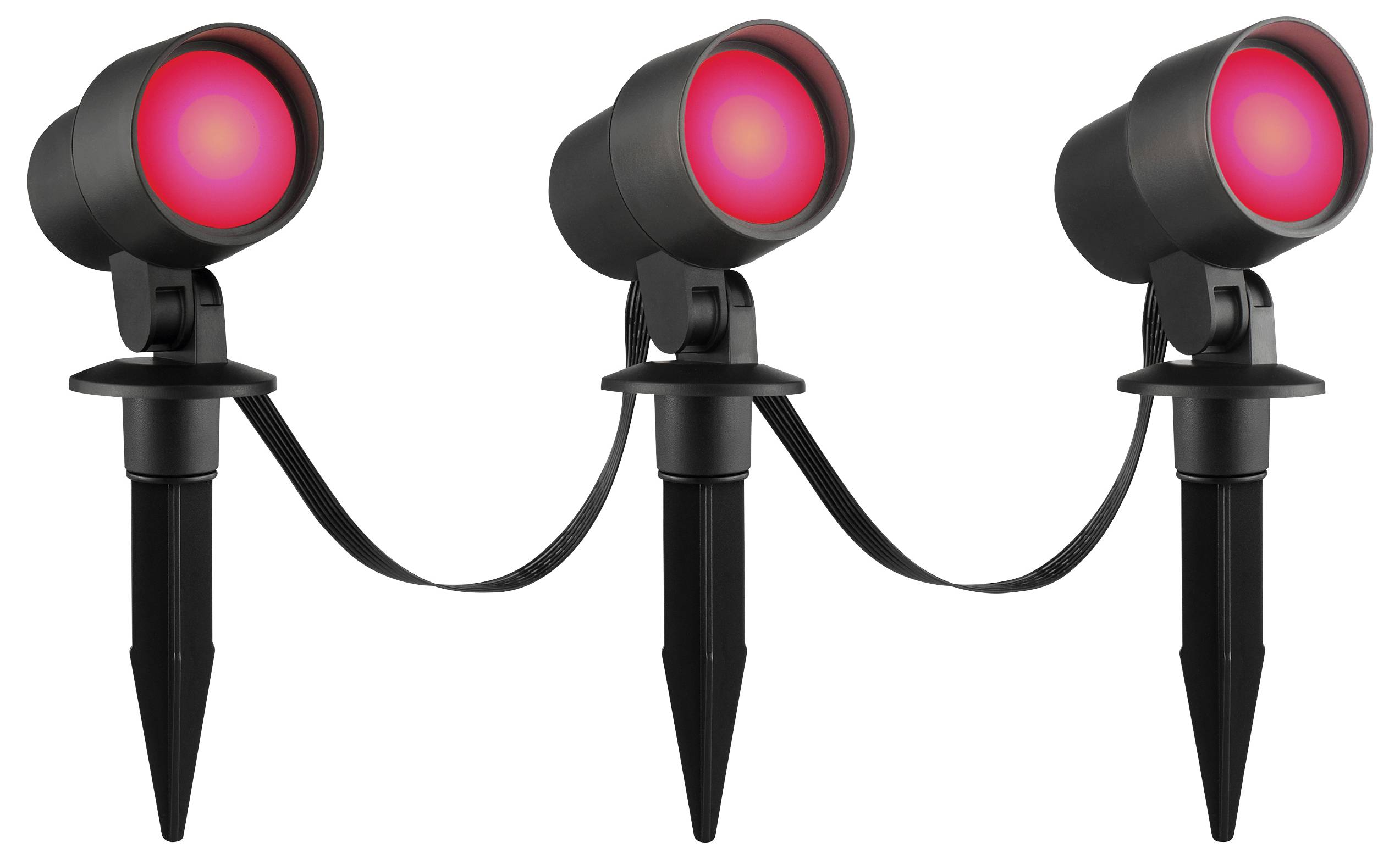 Twee zwarte buitenspotlights met gloeiende rode lampen zijn met elkaar verbonden door een kabel. De spotlights zijn gemonteerd op puntige staken.
