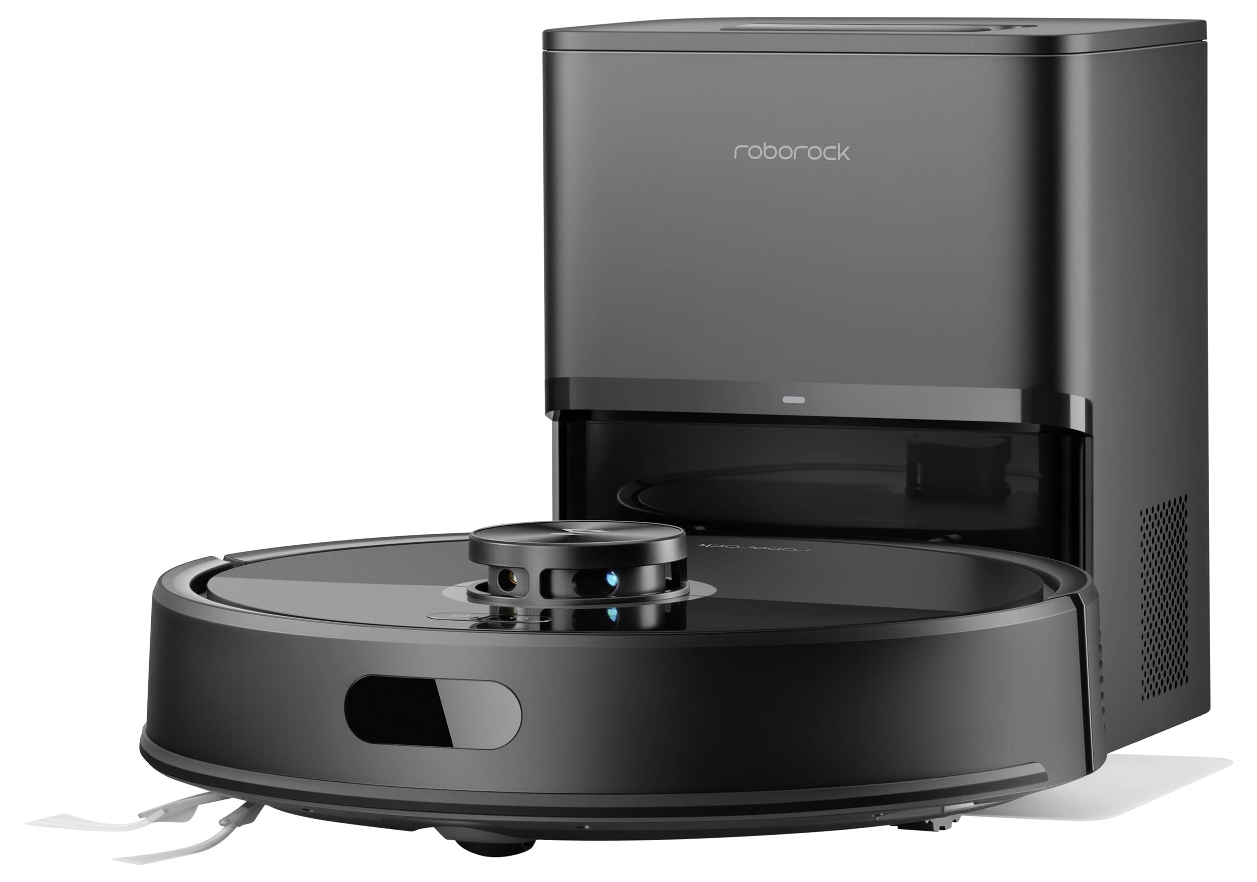 Autonome robotstofzuiger positioneerd voor het oplaadstation, ontworpen voor geautomatiseerde huishoudelijke schoonmaak.