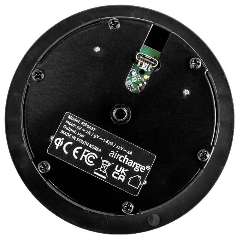 Ronde zwarte oplaadmat onderkant met etiket met specificaties: 'Model: AIR0527, Input: 5V=2A, 9V=1.67A, 12V=2A', Gemaakt in Zuid-Korea.