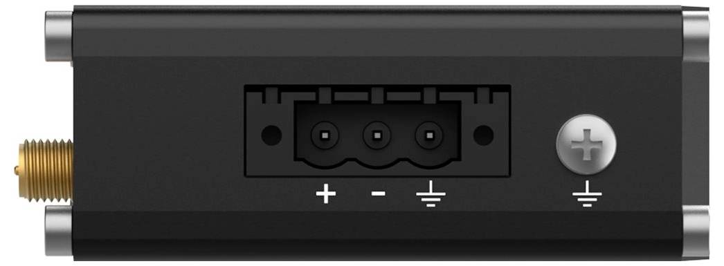 'DC-stroommodule met connector en schroefklemmen. Gelabeld met symbolen voor positief (+), negatief (-) en aarding (⏚) voor bedrading oriëntatie.'