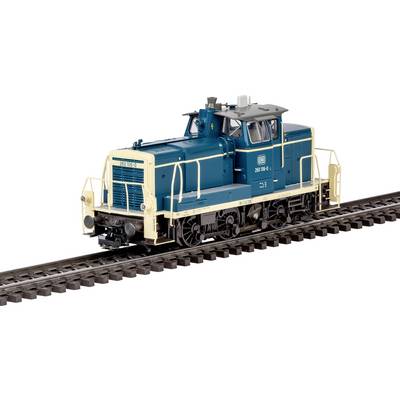 Een modeltreinelocomitief in blauw en wit op railssporen, met ingewikkelde details en compact ontwerp.