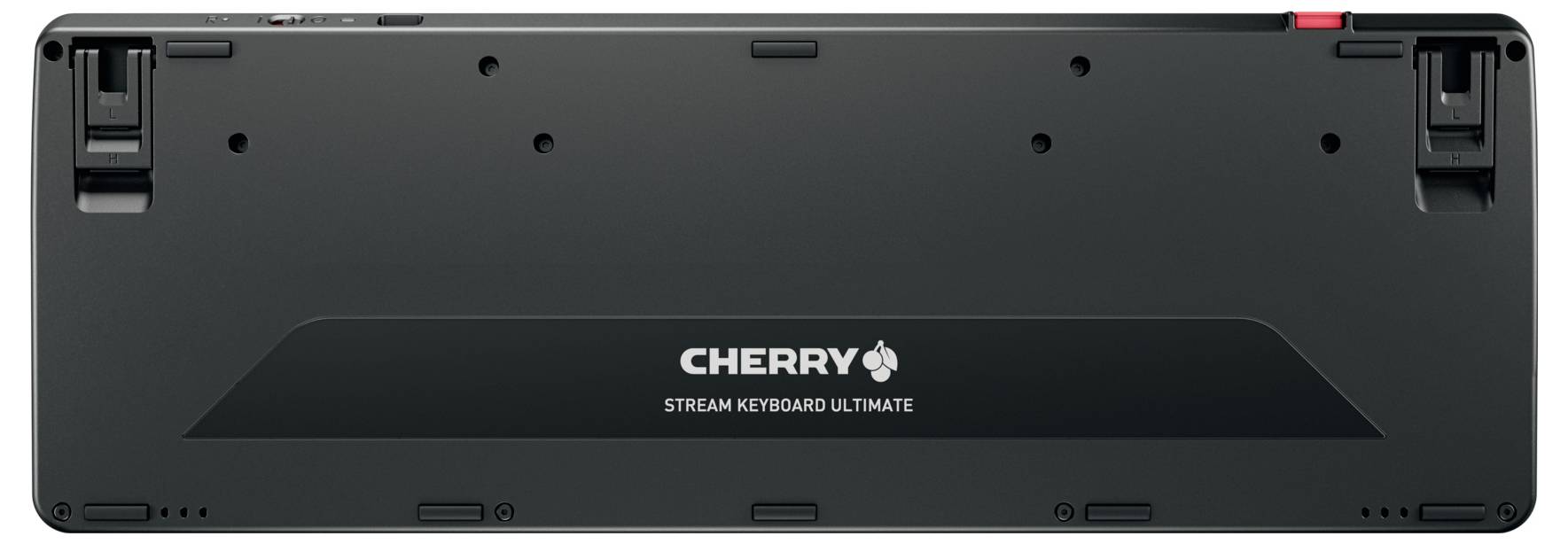 De afbeelding toont het achteraanzicht van een 'CHERRY Stream Keyboard Ultimate', met zichtbare steunpoten en bevestigingspunten.