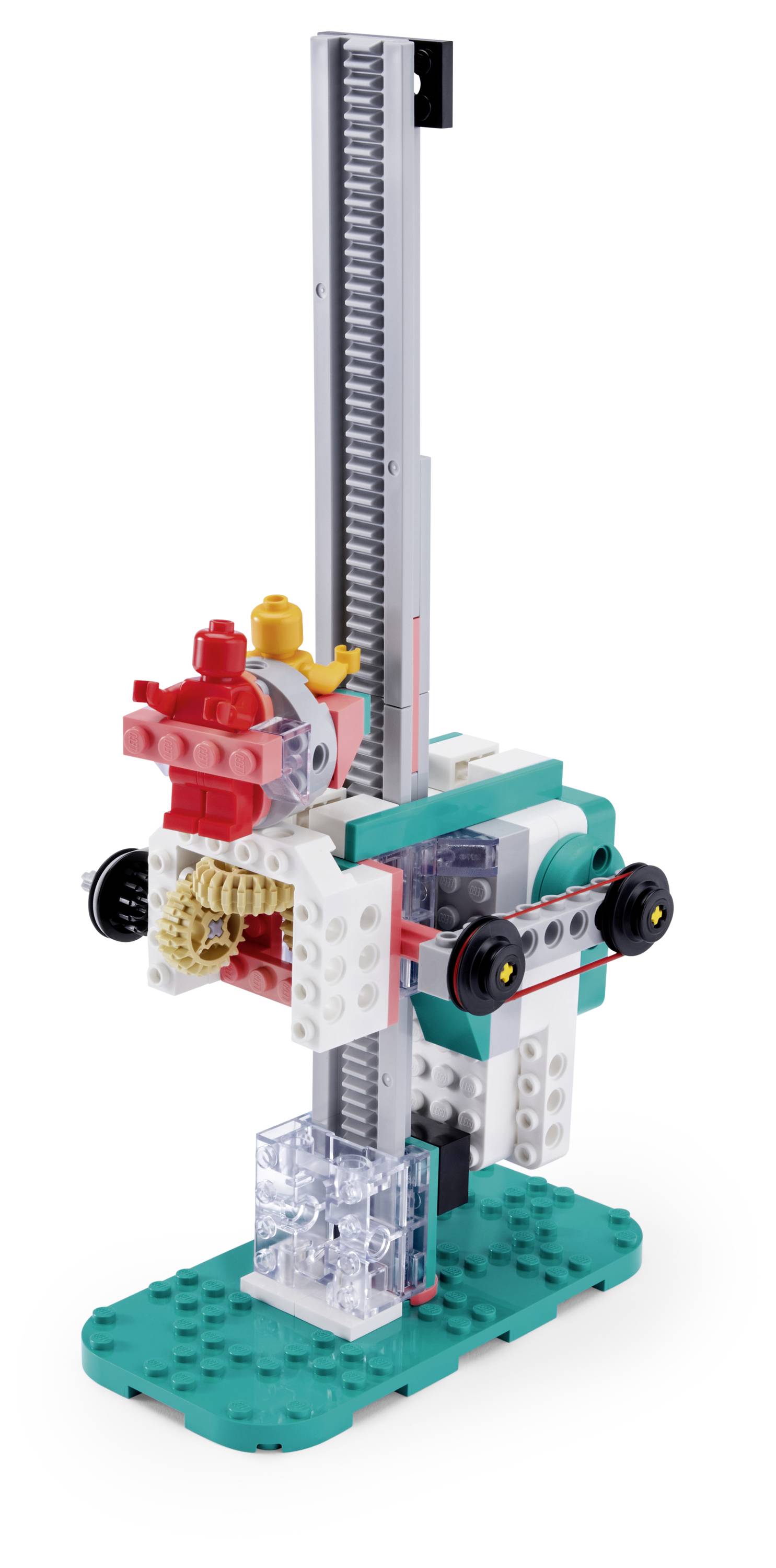 Een LEGO-mechanisme met tandwielen en assen, gemonteerd op een groene basis. Het heeft een verticaal grijs tandstangenstelsel en gekleurde bakstenen, die beweging demonstreren.