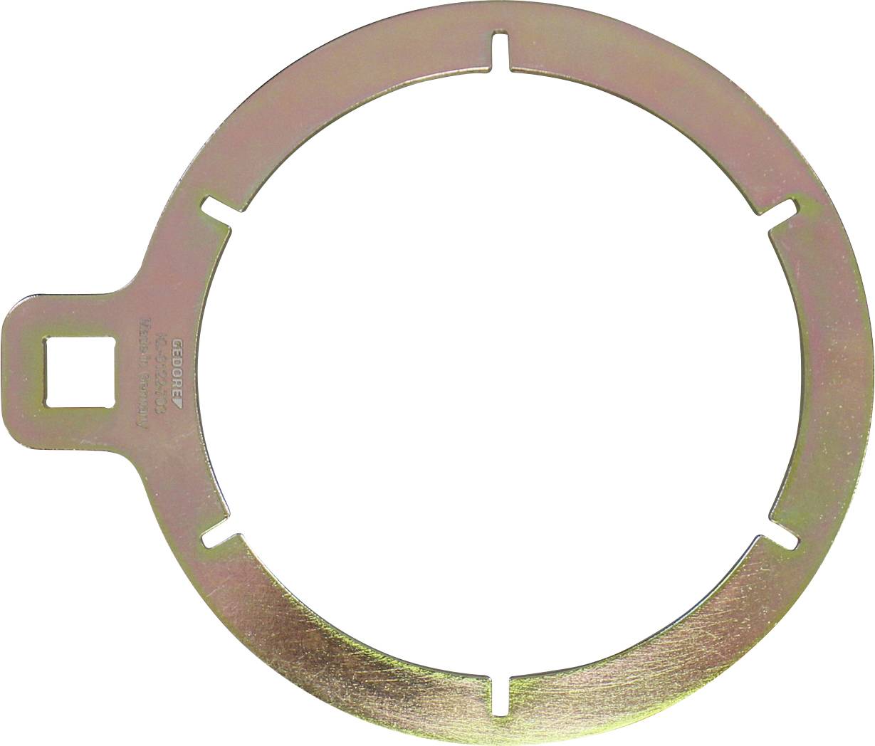 Een circulair metalen object met een tab en vierkante inkeping, gebruikt als een vergrendel- of beveiligingsonderdeel. Het heeft gelijkmatig verdeelde rechthoekige uitsnijdingen.