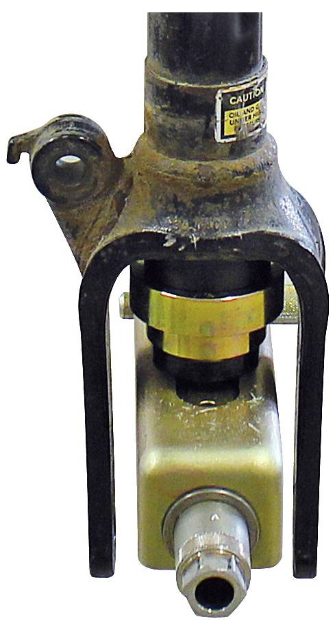 Een hydraulische cilinder met een aangesloten U-beugel en bout, gebruikt voor het uitoefenen van kracht of beweging in mechanische processen.