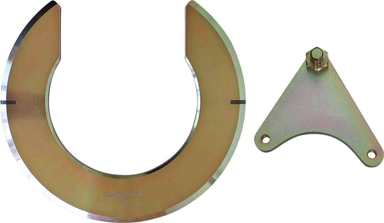 Een cilindrische metalen maat met een 3 erop, met een schroefdraadsectie aan het ene uiteinde en een geribbelde greep aan het andere.