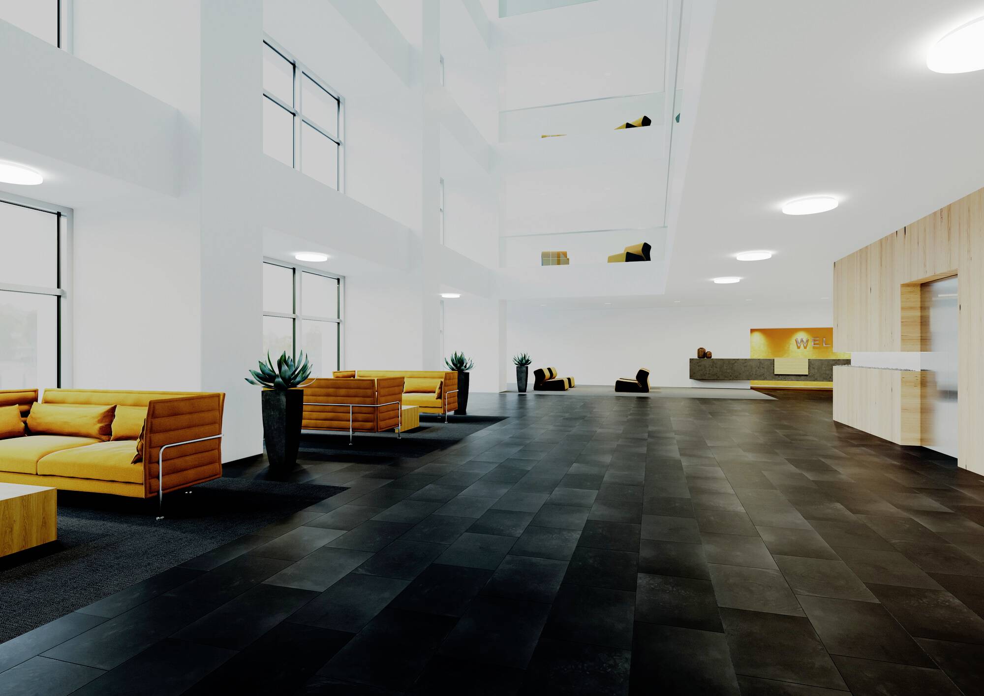 Een ruime, moderne lobby met grote ramen, zwarte tegelvloer, gele banken, planten en een receptiebalie aan de achterkant.