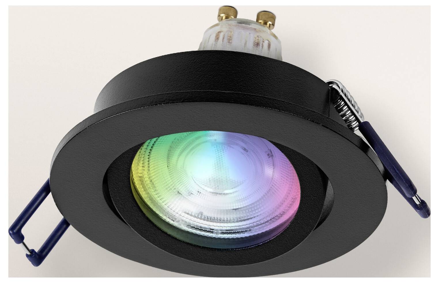Ingebouwde zwarte lichtarmatuur met een gekleurde LED-lamp, die een spectrum van kleuren toont, waaronder groen, blauw en roze.