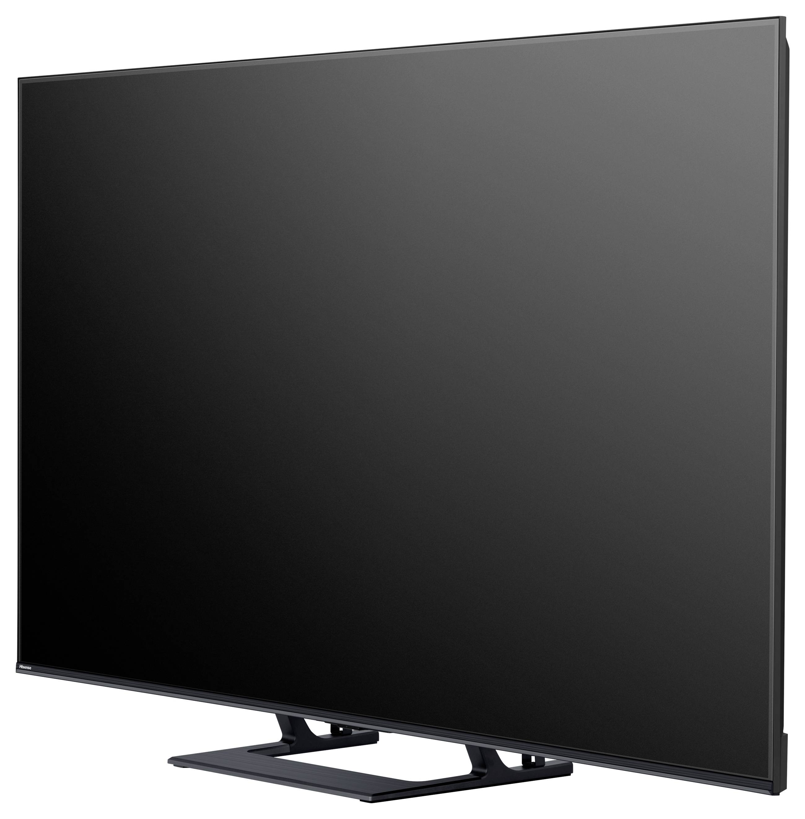 Een flatscreen-televisie op een standaard met een minimalistisch zwart frame en reflecterend scherm, bekeken vanuit een schuine hoek.