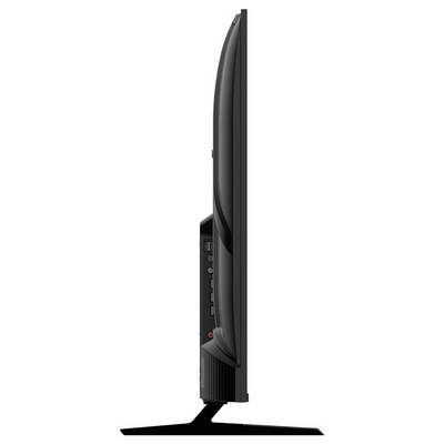 Een zijprofielweergave van een flat-screen televisie die zijn slanke ontwerp en V-vormige standaard toont.