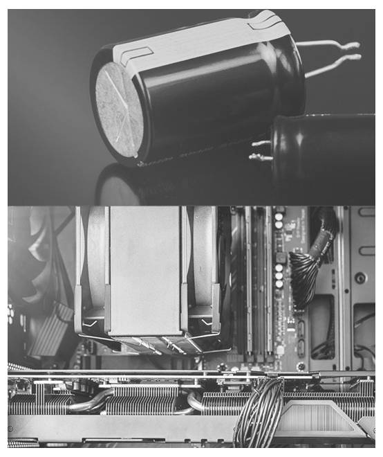 'Detailopname van een condensator en het binnenwerk van een computer, met een koelventilator en elektronica. Nadruk op elektronische componenten.'