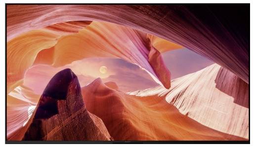 Abstracte afbeelding van stromende oranje, roze en paarse canyonachtige rotsformaties met een kleine zon in het centrum.