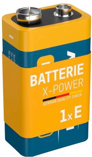 Geel en blauwe 9V batterij gelabeld 'BATTERIE X-POWER' en '1x E' met Duitse kwaliteitscontrole tekst.