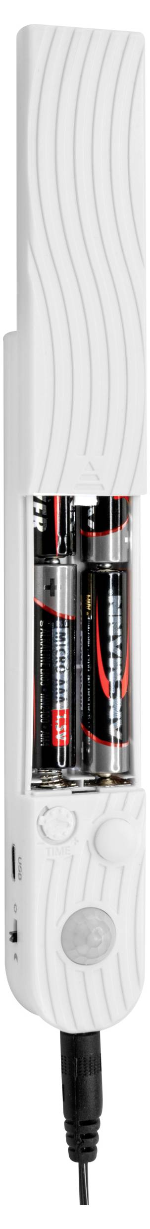Wit handheld apparaat met een gestructureerde grip, twee AA-batterijen zichtbaar in het compartiment, en een snoer aangesloten op de onderkant.