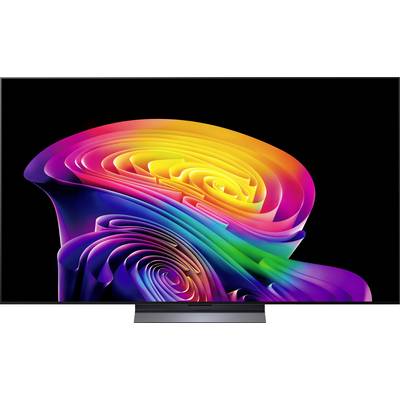 Abstract kleurig 3D-wervelkunstwerk op een computermonitor tegen een zwarte achtergrond.