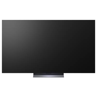 Een flatscreen televisie met een donker leeg scherm op een standaard.