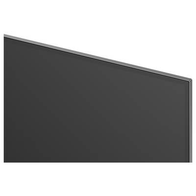 Close-up van een dunne flatscreen-displaypaneel met een donker leeg scherm en metalen rand.