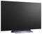 Grote flat-screen televisie met een leeg zwart display op een standaard tegen een witte achtergrond.