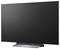 Grote zwarte flatscreen-televisie op een voet, weergegeven tegen een witte achtergrond.