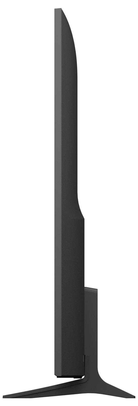 Zijaanzicht van een slanke zwarte vloerlamp met een smalle verticale steel en een brede platte voet.