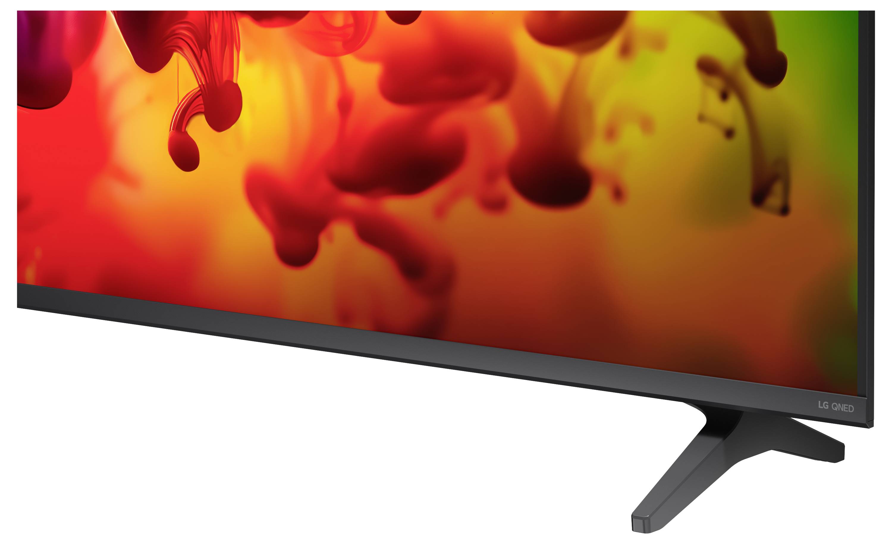 Flatscreen-monitor die een levendig rood, oranje en geel abstract inktspat-afbeelding op een witte achtergrond weergeeft