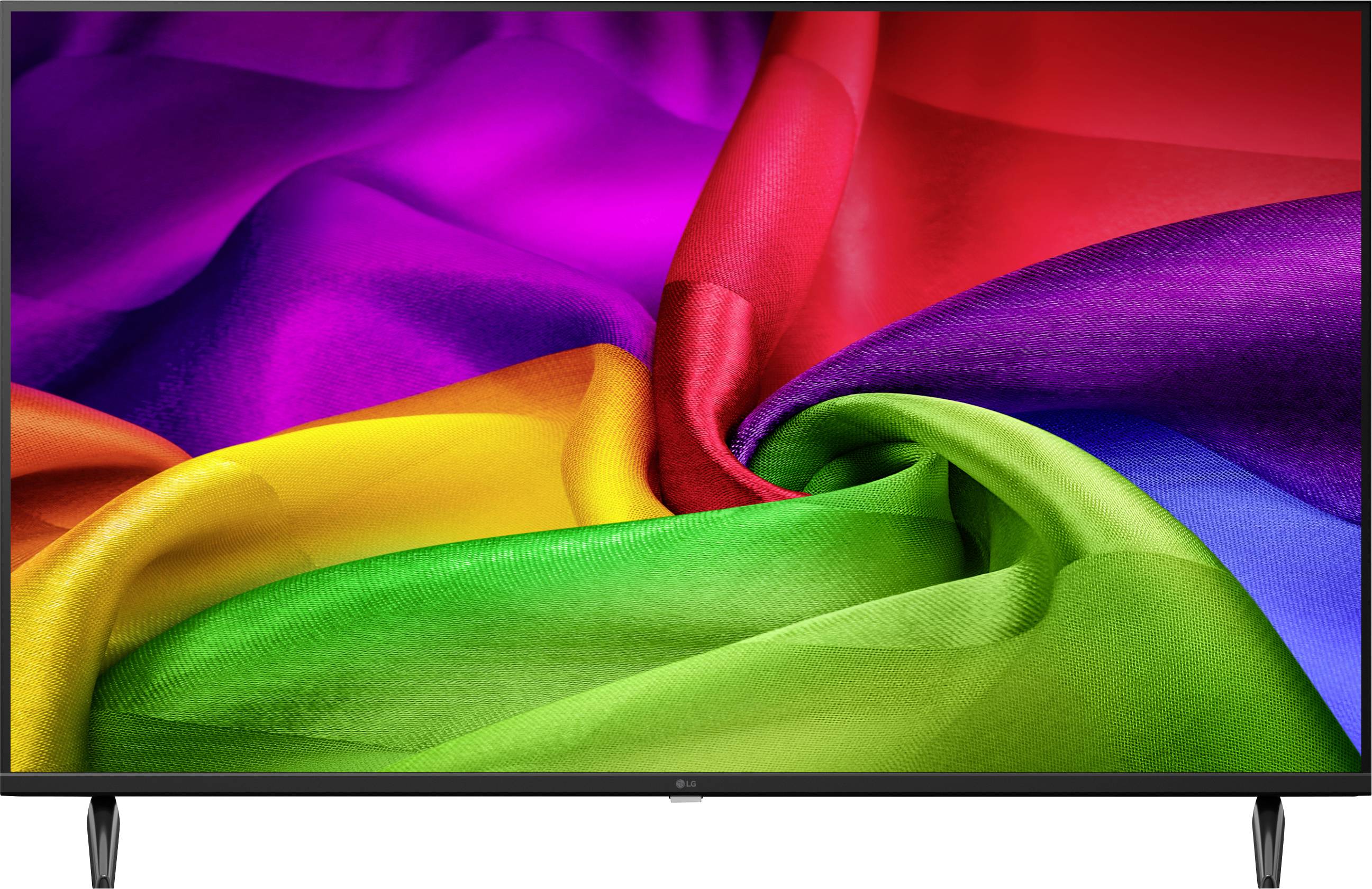 Vlakscherm-tv die een levendige regenboog-spiraal abstract beeld weergeeft op een zwarte rand met standaard.