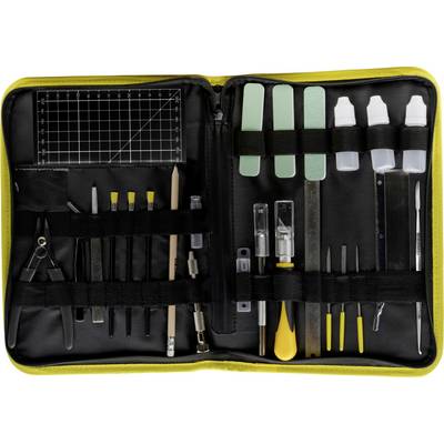 Open zwart ritsvak gereedschapskist met assortiment kunst- en precisiewerktuigen, inclusief linialen, messen, pincetten, kwasten, vijlen en kleine flessen.