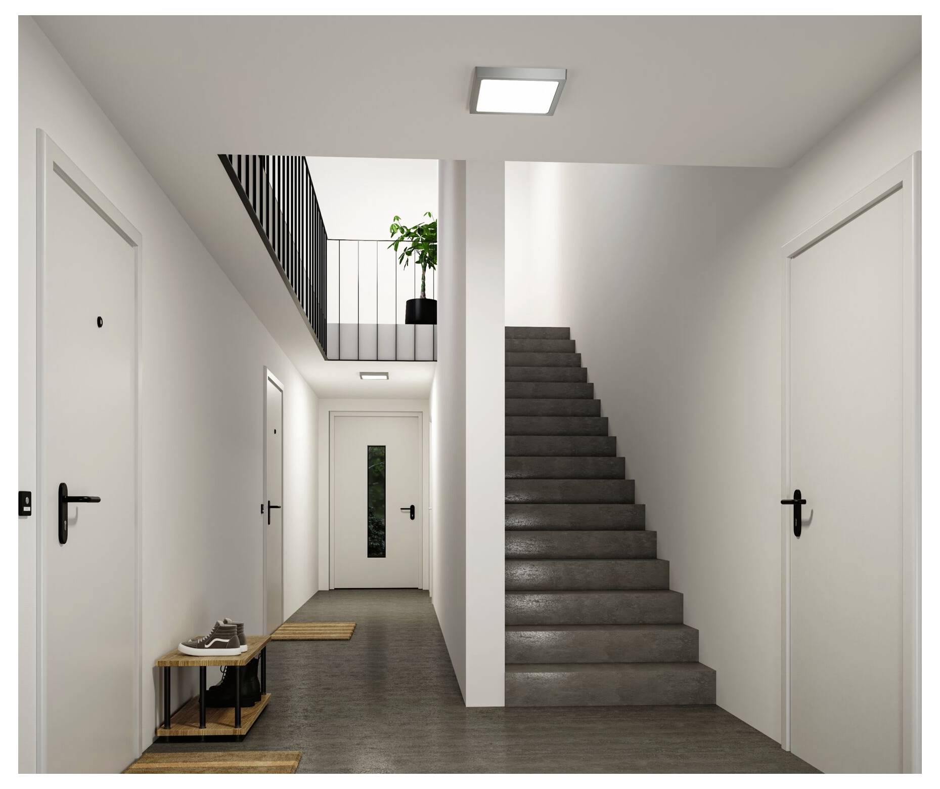 Moderne apartementgang met witte deuren, een trap aan de rechterkant en een kleine bovenverdieping met een potplant.