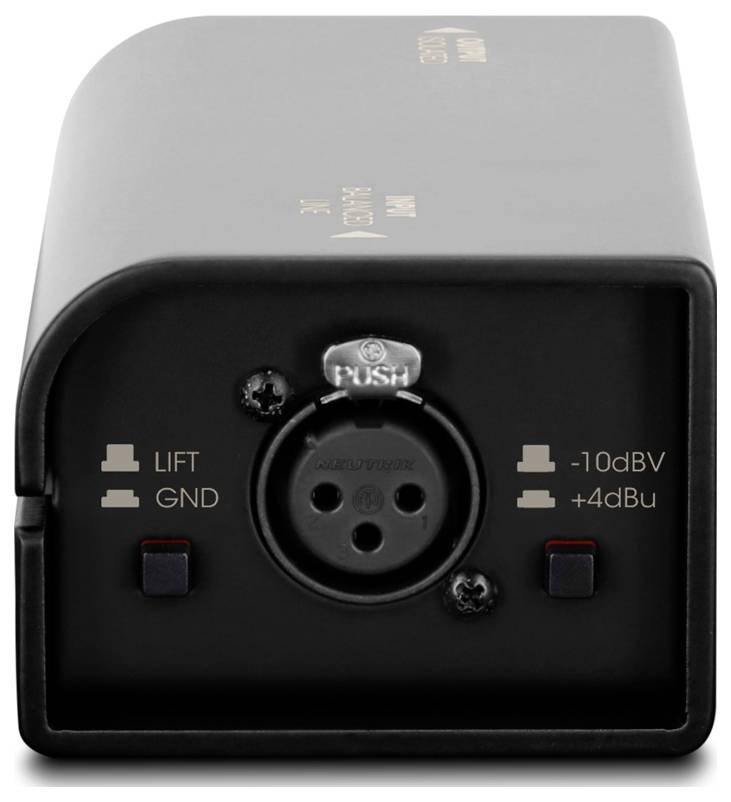 Zwarte audioversterkerbox met een centraal XLR-aansluiting gelabeld 'PUSH', schakelaarlabels 'LIFT GND' en '-10dBV/+4dBu'.