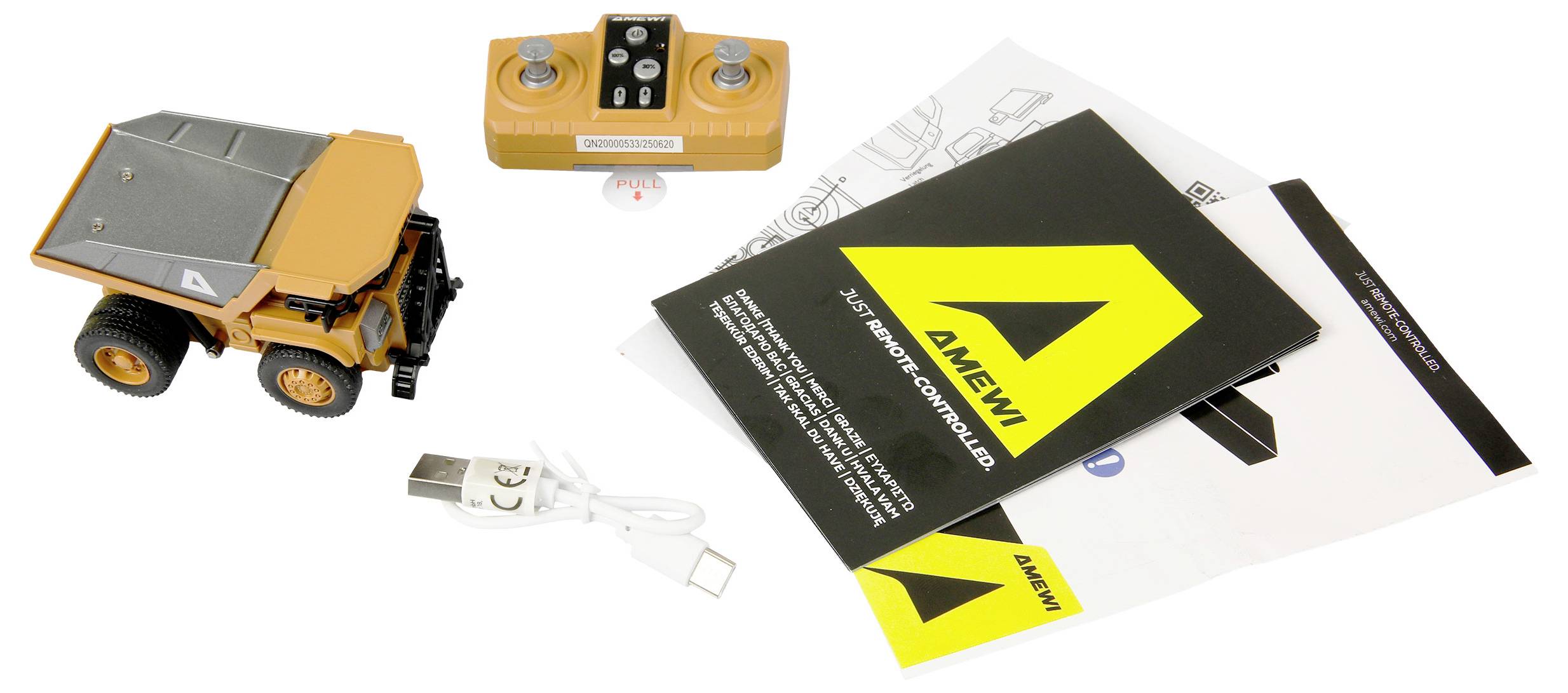 Assorteerde Aview elektronische kit inhoud: speelgoedkipauto, handheld controller, USB-kabel, handleidingen en stickers op een witte achtergrond.