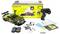 Driftschuim auto RC-kit met afstandsbediening, oplader, reservewielen en instructiehandleiding voor de productverpakking.