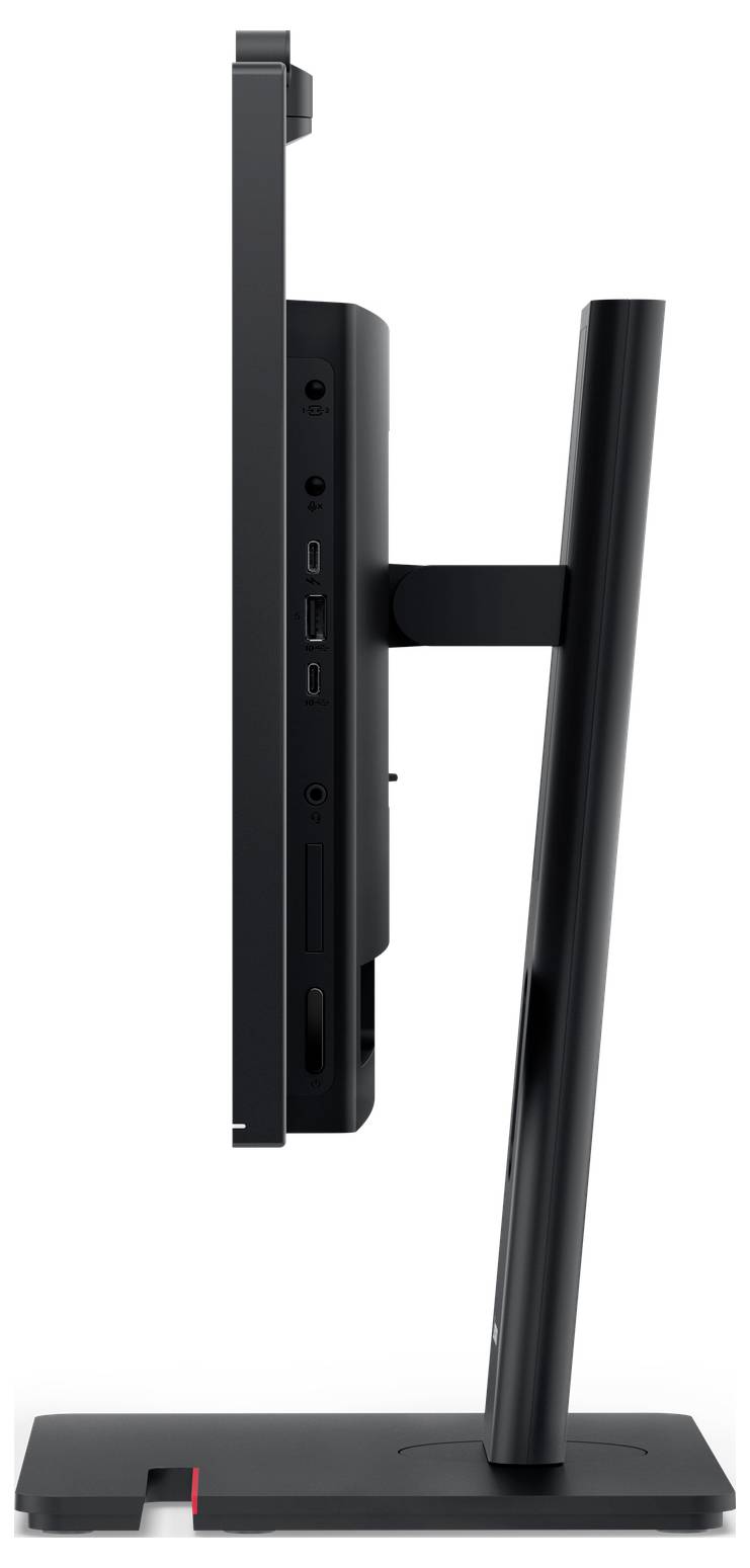 Zijkant van een zwarte desktopmonitor op een standaard, met het slanke scherm, achterpoorten en hoekige steunarm zichtbaar.