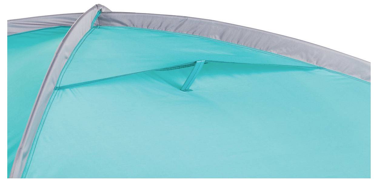 Close-up van een turquoise en grijze stoffen luifel of tent, met gebogen steunen en gespannen materiaal.