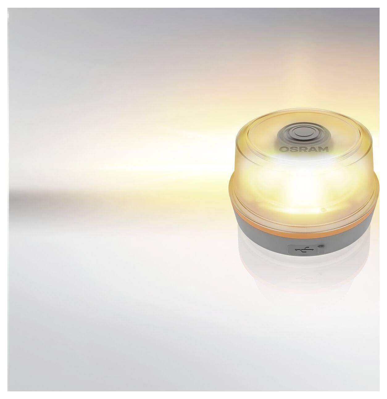 Gloeiende OSRAM LED-signalarlicht op een witte achtergrond, uitstralend een helder oranje-gele signaalbundel.