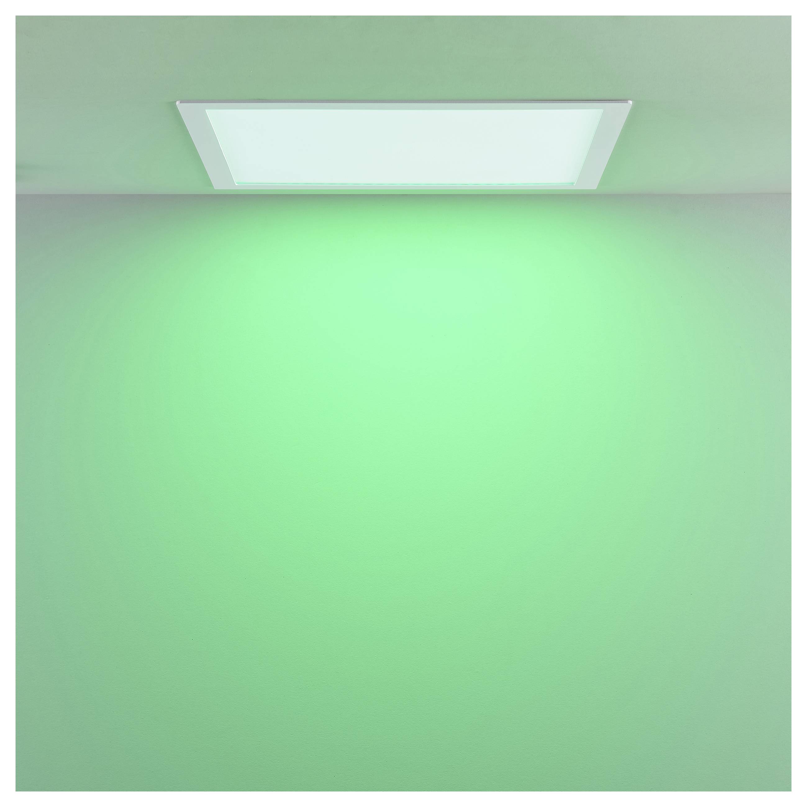 Een aan het plafond gemonteerd rechthoekig lichtpaneel werpt een zachte groene gloed over een eenvoudige wand en plafond.