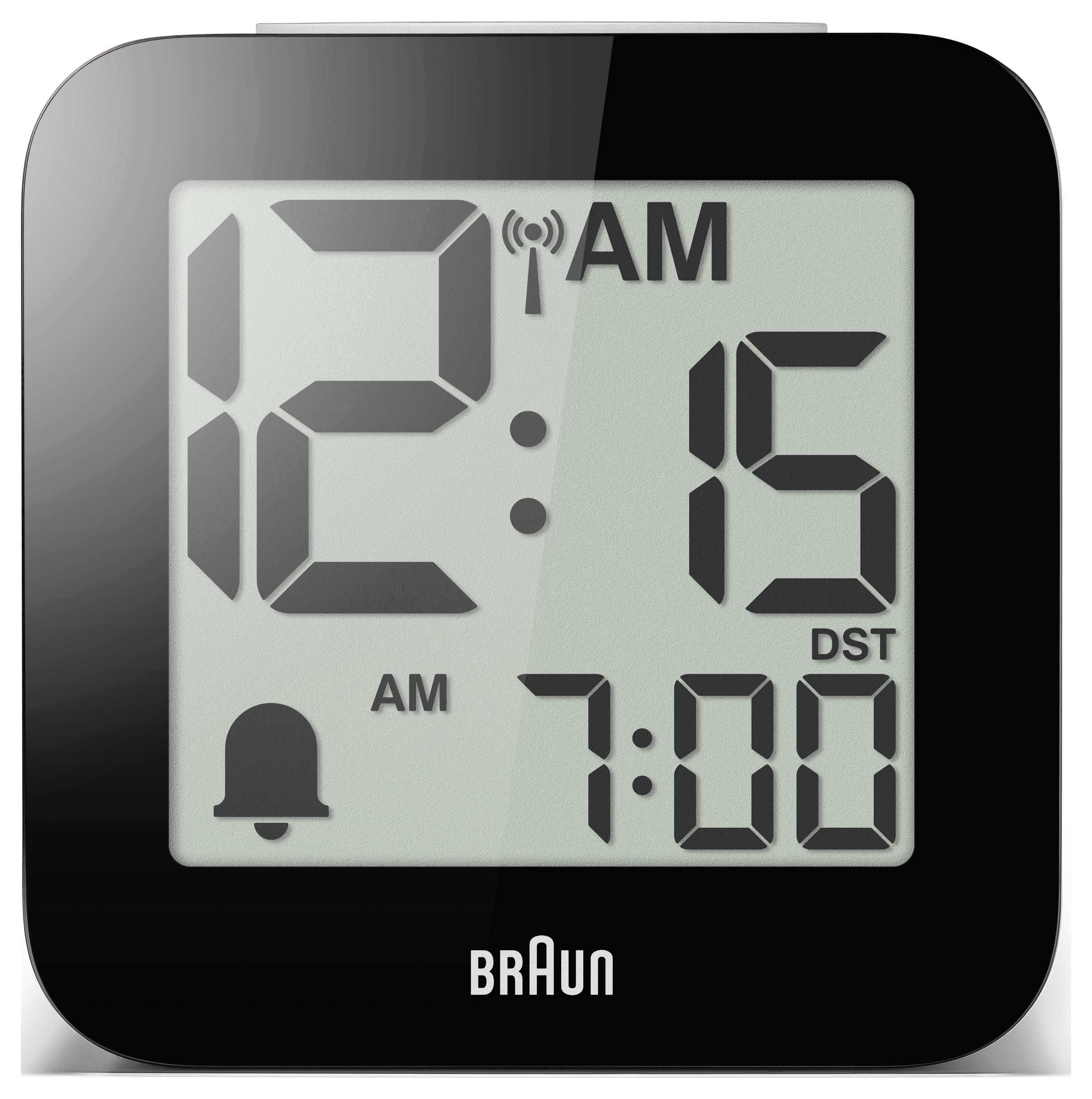 Zwart Braun digitaal klokdisplay dat 12:15 AM toont, met alarm ingesteld op 7:00 AM en DST-indicator.
